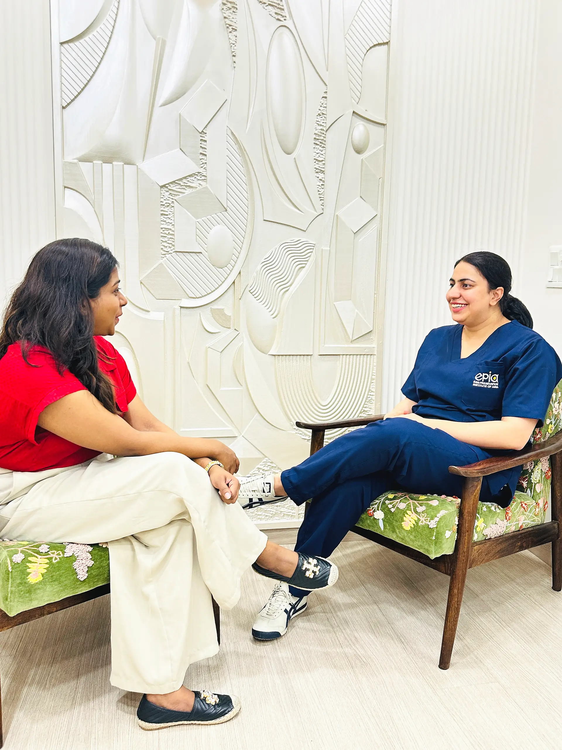 EPIA fertility specialist speaking with a patient during a private consultation